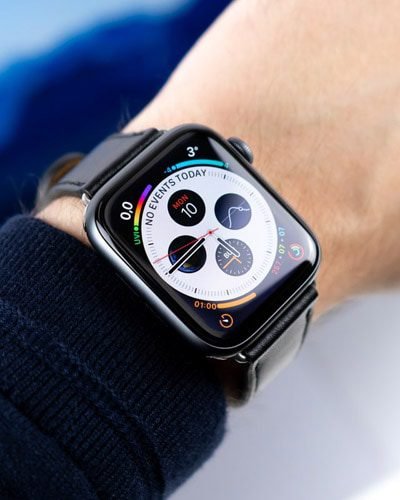 Space gray apple watch with black leather strap